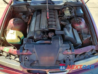 Zdjęcie 11 z 12 samochodu: 1994 BMW 325 IC AUTOMATIC VIN:WBABJ6326RJD36572 - miniatura
