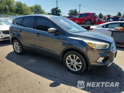 Czwarte zdjęcie samochodu z boku: 2017 FORD ESCAPE SE VIN:1FMCU9GD2HUC75903 - miniatura