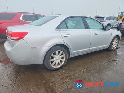 Trzecie zdjęcie samochodu z tyłu: 2010 LINCOLN MKZ VIN:3LNHL2GC9AR654448 - miniatura
