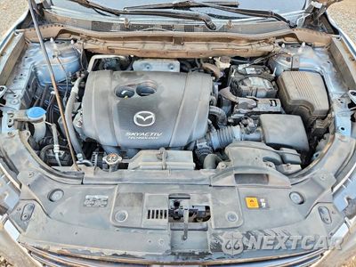 Zdjęcie 12 z 14 samochodu: 2016 MAZDA CX-5 GT VIN:JM3KE4DY6G0864408 - miniatura