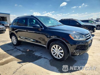 Czwarte zdjęcie samochodu z boku: 2011 VOLKSWAGEN TOUAREG V6 VIN:WVGFF9BPXBD003633 - miniatura