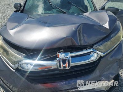 Zdjęcie 11 z 13 samochodu: 2018 HONDA CR-V LX VIN:5J6RW5H34JL001681 - miniatura