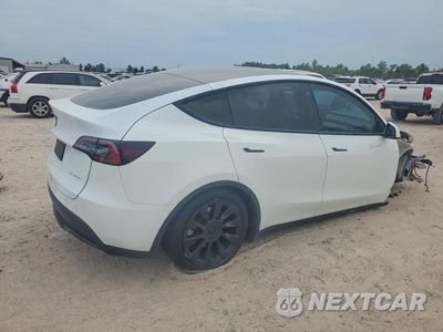 Trzecie zdjęcie samochodu z tyłu: 2023 TESLA MODEL Y VIN:7SAYGDEE4PA117540 - miniatura