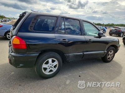 Trzecie zdjęcie samochodu z tyłu: 2004 HYUNDAI SANTA FE GLS VIN:KM8SC13D54U739170 - miniatura