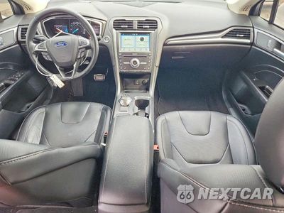 Zdjęcie 8 z 13 samochodu: 2017 FORD FUSION TITANIUM VIN:3FA6P0D99HR319025 - miniatura