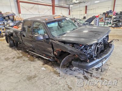 Czwarte zdjęcie samochodu z boku: 2004 CHEV SILVERADO VIN:1GCJC33134F111159 - miniatura