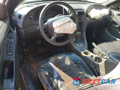 Zdjęcie 8 z 12 samochodu: 2002 FORD MUSTANG VIN:1FAFP44472F180027 - miniatura