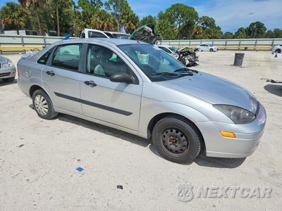 Czwarte zdjęcie samochodu z boku: 2002 FORD FOCUS LX VIN:1FAFP33P32W307037 - miniatura