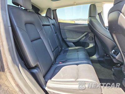 Zdjęcie 11 z 14 samochodu: 2024 TESLA MODEL Y VIN:7SAYGAEE8RF004114 - miniatura