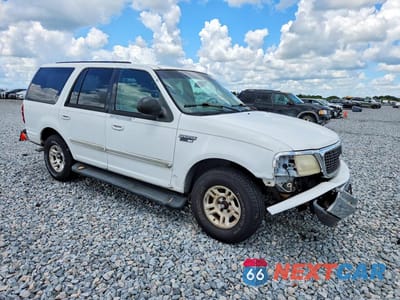 Czwarte zdjęcie samochodu z boku: 2000 FORD EXPEDITION XLT VIN:1FMRU15L0YLB51169 - miniatura