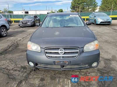 Piąte zdjęcie samochodu w środku: 2002 NISSAN MAXIMA GXE VIN:JN1DA31D42T430832 - miniatura