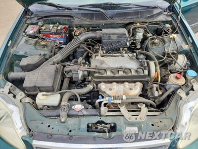 Zdjęcie 11 z 12 samochodu: 2000 HONDA CIVIC LX VIN:2HGEJ6675YH600631 - miniatura