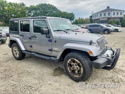 Czwarte zdjęcie samochodu z boku: 2015 JEEP WRANGLER UNLIMITED SAHARA VIN:1C4BJWEG5FL626777 - miniatura
