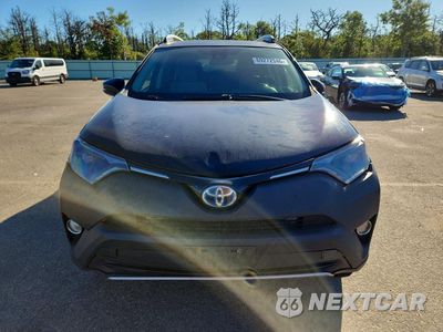 Piąte zdjęcie samochodu w środku: 2017 TOYOTA RAV4 HYBRID XLE VIN:JTMRJREV0HD113593 - miniatura