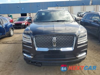 Piąte zdjęcie samochodu w środku: 2021 LINCOLN NAVIGATOR RESERVE VIN:5LMJJ2LT4MEL11287 - miniatura