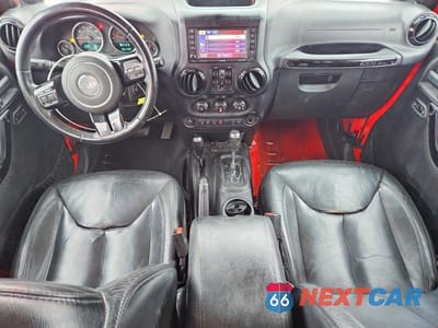 Zdjęcie 8 z 13 samochodu: 2014 JEEP WRANGLER UNLIMITED SAHARA VIN:1C4HJWEG0EL324418 - miniatura