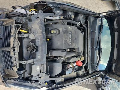 Zdjęcie 11 z 12 samochodu: 2013 LINCOLN MKS VIN:1LNHL9DK6DG603599 - miniatura