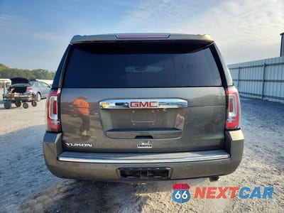 Zdjęcie 6 z 13 samochodu: 2018 GMC YUKON DENALI VIN:1GKS1CKJ3JR347613 - miniatura
