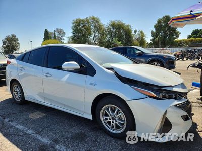 Czwarte zdjęcie samochodu z boku: 2021 TOYOTA PRIUS PRIME XLE VIN:JTDKAMFP9M3170802 - miniatura