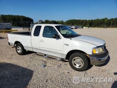 Czwarte zdjęcie samochodu z boku: 2003 FORD F150 VIN:1FTRX172X3NA73447 - miniatura