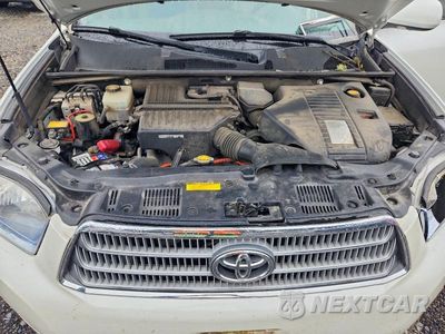 Zdjęcie 12 z 13 samochodu: 2010 TOYOTA HIGHLANDER HYBRID LIMITED VIN:JTEJW3EH7A2041553 - miniatura