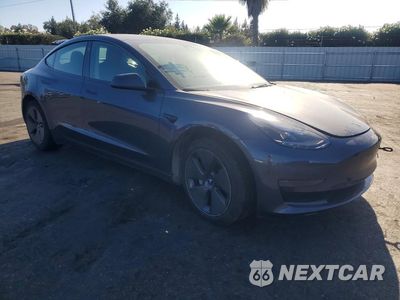 Czwarte zdjęcie samochodu z boku: 2023 TESLA MODEL 3 VIN:5YJ3E1EA6PF463097 - miniatura