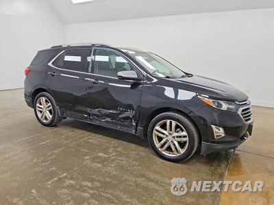 Czwarte zdjęcie samochodu z boku: 2018 CHEVROLET EQUINOX PREMIER VIN:3GNAXNEXXJL289015 - miniatura