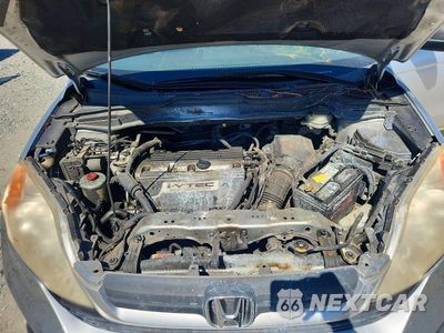 Zdjęcie 12 z 13 samochodu: 2009 HONDA CR-V LX VIN:JHLRE38389C000092 - miniatura
