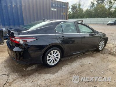 Trzecie zdjęcie samochodu z tyłu: 2022 TOYOTA CAMRY LE VIN:4T1C11AK0NU641922 - miniatura