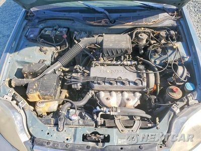 Zdjęcie 11 z 12 samochodu: 2000 HONDA CIVIC LX VIN:2HGEJ6571YH584204 - miniatura