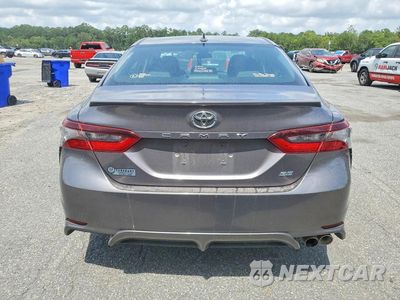 Zdjęcie 6 z 12 samochodu: 2021 TOYOTA CAMRY SE VIN:4T1G11AK4MU606560 - miniatura