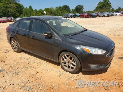 Czwarte zdjęcie samochodu z boku: 2015 FORD FOCUS SE VIN:1FADP3F26FL204967 - miniatura