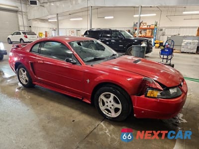 Czwarte zdjęcie samochodu z boku: 2002 FORD MUSTANG VIN:1FAFP40472F176257 - miniatura