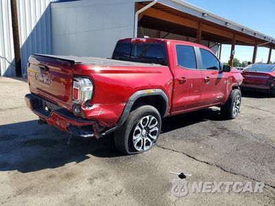 Trzecie zdjęcie samochodu z tyłu: 2023 GMC CANYON AT4 VIN:1GTP6DEK5P1224206 - miniatura
