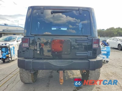 Zdjęcie 6 z 12 samochodu: 2011 JEEP WRANGLER UNLIMITED SPORT VIN:1J4BA3H15BL579244 - miniatura