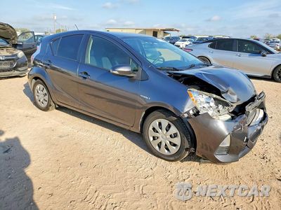 Czwarte zdjęcie samochodu z boku: 2014 TOYOTA PRIUS C THREE VIN:JTDKDTB34E1560109 - miniatura