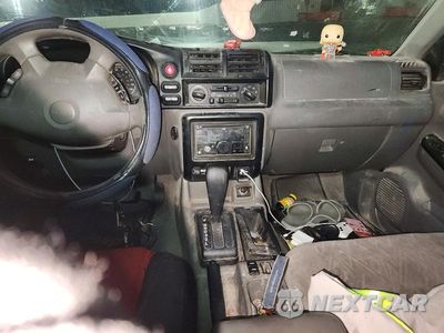 Zdjęcie 8 z 14 samochodu: 2003 ISUZU RODEO S VIN:4S2CK58W234306678 - miniatura