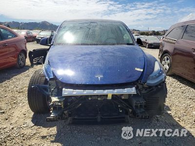 Piąte zdjęcie samochodu w środku: 2022 TESLA MODEL Y VIN:7SAYGAEE3NF493127 - miniatura