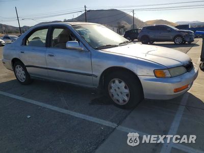 Czwarte zdjęcie samochodu z boku: 1997 HONDA ACCORD LX VIN:1HGCD5637VA245767 - miniatura
