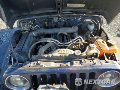 Zdjęcie 12 z 13 samochodu: 2003 JEEP WRANGLER COMMANDO VIN:1J4FA39S33P301087 - miniatura