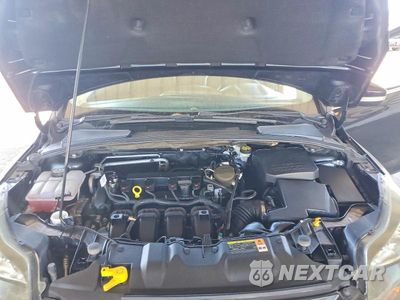 Zdjęcie 11 z 12 samochodu: 2013 FORD FOCUS TITANIUM VIN:1FADP3N20DL382596 - miniatura