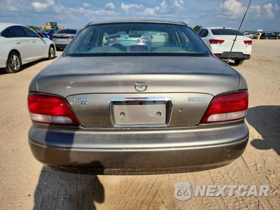 Zdjęcie 6 z 12 samochodu: 1999 MAZDA 626 ES VIN:1YVGF22C7X5893503 - miniatura