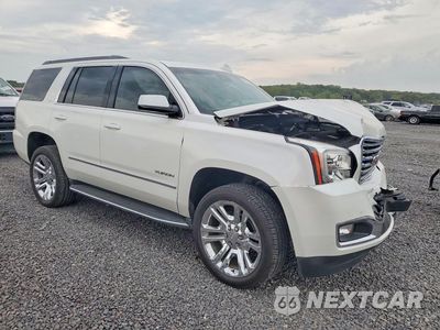 Czwarte zdjęcie samochodu z boku: 2017 GMC YUKON SLT VIN:1GKS2BKC1HR343577 - miniatura
