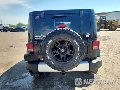 Zdjęcie 6 z 12 samochodu: 2014 JEEP WRANGLER UNLIMITED SAHARA VIN:1C4HJWEG6EL109741 - miniatura