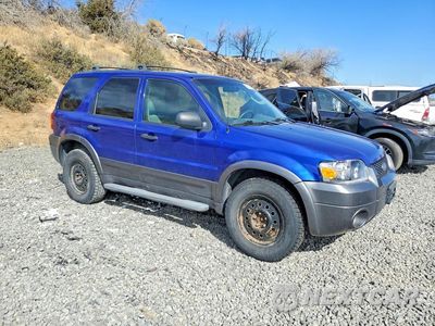 Czwarte zdjęcie samochodu z boku: 2006 FORD ESCAPE XLT VIN:1FMCU93126KA55018 - miniatura