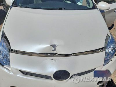 Zdjęcie 11 z 12 samochodu: 2014 TOYOTA PRIUS TWO VIN:JTDKN3DU8E1765404 - miniatura