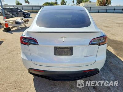 Zdjęcie 6 z 12 samochodu: 2022 TESLA MODEL Y VIN:7SAYGDEF7NF410230 - miniatura