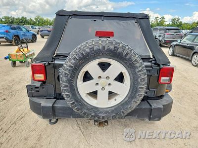 Zdjęcie 6 z 13 samochodu: 2010 JEEP WRANGLER UNLIMITED SAHARA VIN:1J4HA5H13AL198349 - miniatura