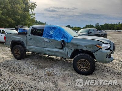 Czwarte zdjęcie samochodu z boku: 2023 TOYOTA TACOMA TRAIL SPECIAL EDITION VIN:3TMCZ5AN7PM539135 - miniatura