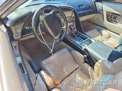 Zdjęcie 8 z 12 samochodu: 1990 CHEVROLET CORVETTE VIN:1G1YY2385L5100345 - miniatura